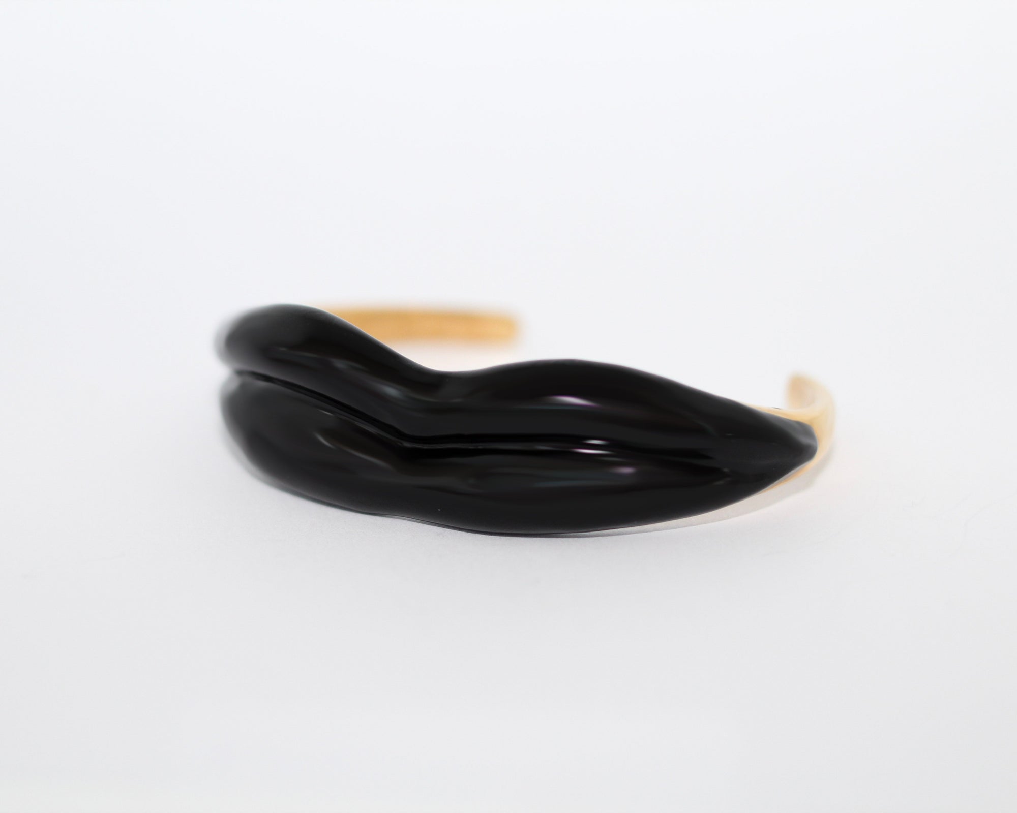 Black Enamel Man Ray Lip Cuff by Nora Kogan